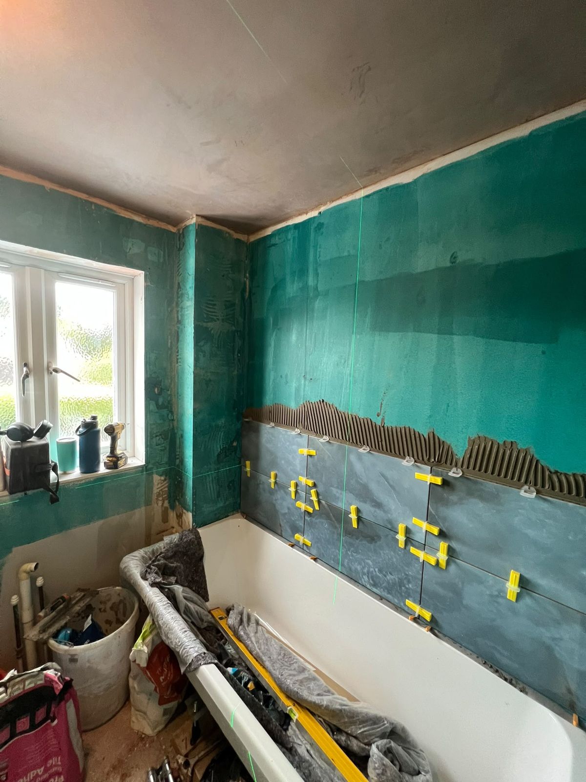 Bath area tanked and prepared for tiling